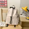 Bolso cubo con cordón de tela de nailon estilo coreano nuevo para mujer, mochila de viaje versátil, mochila escolar de gran capacidad para estudiantes, moda