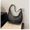 Bolsa de axila feminina transfronteiriça 2026 nova bolsa versátil de ombro, popular simples mais vendida bolsa de ombro única estilo bolinho