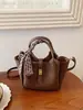 Bolsa de mão tipo balde de luxo para mulheres, nova bolsa de ombro da moda 2025, bolsa transversal casual minimalista de nicho para mulheres