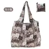 Bolsa de compras plegable en stock, nailon ligero, impermeable, portátil, bolso de hombro de tamaño mediano, adecuado para la compra
