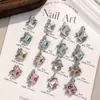 Accesorios para Uñas Lazo Largo de Ángulo Recto con Diamantes Apilados, Caramelo de Roca Blanco Brillante, Lazo Lateral Plateado Producto Terminado con Diamantes Apilados