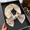 Bufanda Larga Fina de Seda Negra con Estampado Paisley para Mujer 2026 Nuevo Estilo Coreano Bufanda Diagonal con Acabado de Lujo y Elegante Accesorio para la Cintura