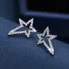 Versión coreana de pendientes de estrella de cinco puntas con forma de metal, joyería de diamante, pendientes dulces de temperamento para mujer, suministro directo de fábrica