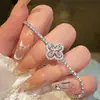 Pulseira Trevo de Quatro Folhas Super Brilhante Luxo Leve Nicho Exquisita Pulseira de Contas Pulseira de Cristal para Mulheres 2025 Novo Estilo Cordão de Mão Joias