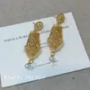 Nuevos Pendientes Retro Chinos para Mujer 2025 Nuevos Pendientes de Flor y Perla Lujo Accesible Elegantes Modernos Pendientes de Gama Alta