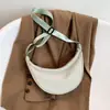 Bolso bandolera de nailon para mujer, nuevo bolso de moda estilo dumpling 2026, bolso de hombro pequeño ligero, bolso de axila, versátil para la escuela o el uso diario