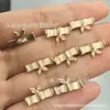 Botão de metal de alta qualidade novo estilo chinês antigo formato de bambu olho de gato zircônia fivela decorativa de luxo leve estilo chinês cheongsam Jade
