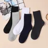 Calcetines otoño hombres desodorantes absorbentes de sudor transpirables Calcetines deportivos de media pantorrilla para hombre otoño e invierno engrosados calcetines de negocios calcetines de moda para todo