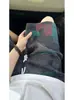 Calça Esportiva Solta da Moda de Verão Estilo Preguiçoso Casual Calça de Cinco Pontos Versátil Fina Calça de Praia Shorts Diários