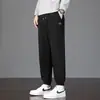 Calça de moletom moderna estilo americano para homens, calças compridas de primavera e outono, versátil e estilosa, adequada para adolescentes, joggers atléticos, calças casuais