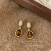 Brincos Pequenos Maillard com Pedra Olho de Tigre em Laço, Brincos Exquisitos e Elegantes, Luxo Acessível, High-End, Brincos Modernos e de Estilo Ocidental