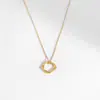 Collar de acero inoxidable dorado estilo ins europeo nuevo Collar creativo de nudo de lazo de lujo ligero para mujer nicho versátil