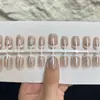 Uñas Portátiles Francesas Ovaladas Cortas Color Café Claro Galvanizado Piezas de Uñas Cat Eye Puras Lindas Girly Deseo Puro Fábrica de Uñas Pre-fabricadas