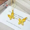 Loja de Ouro Mesmo Estilo Ouro Antigo Incrustado com Diamante Pingente de Borboleta Novo Chinês Versátil Borboleta Batendo Colar Atacado