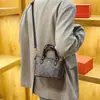 Bolso de mujer nuevo de alta gama estilo francés 2026, bolso de mano estampado, bolso versátil de hombro y cruzado, bolso de moda para mujer