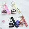 Llavero colgante de bolsa de burro simulada transfronteriza, colgante de minibolso estilo Chanel, muñeca linda regalo pequeño al por mayor