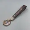 Llavero creativo nuevo para coche, estilo largo para mujer, cordón para llavero con incrustaciones de diamantes de lujo ligero, accesorio para coche al por mayor
