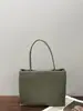 2026 Nova Bolsa Acordeão de Fileira Bolsa Quadrada Pequena em Pele de Ovelha Bolsa de Mão Minimalista Descontraída Bolsa de Ombro