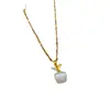 [Acero de titanio] Collar de manzana con ojo de gato y diamantes de oro real con microincrustaciones para mujer, nueva cadena de clavícula, diseño de nicho de lujo ligero.