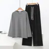 Nova blusa de moda feminina Outono/Inverno 2026, camisa básica listrada de manga longa, conjunto casual versátil que afina