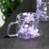Taza de café de vidrio con flores secas personalizadas, resistente a altas temperaturas, alto valor estético, diseño floral, taza de vidrio de doble pared de borosilicato alto para comercio transfronterizo
