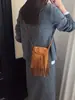 Bolso transfronterizo para mujer nicho retro americano borla bolsa para teléfono Heng Geng nuevo estilo bandolera diagonal bolsa cuadrada pequeña estilo Hong Kong