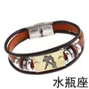 Suministro directo de fábrica comercio electrónico transfronterizo explosiones pulsera de cuero de vaca doce constelaciones hebilla de acero inoxidable pulsera de cuero
