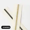 En stock No. 5 cremalleras de metal falso con dientes dorados, cremallera de resina recubierta, bidireccional dorado claro con base negra, cremallera de dientes de cobre falso