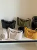 Bolso de mano liso súper popular transfronterizo para mujer, nuevo modelo 2026, diseño de nicho, bolso cruzado versátil de alta gama para el día a día
