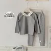 Conjunto de Pijama Infantil con Estampado Completo de Conejo Panadero Otoño 2026, Nuevo Top y Pantalones de Lana Elástica de Cuello Redondo para el Hogar Otoño-Invierno