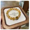 Cristal de torre amarelo natural partículas grandes flor de cola vermelho sangue de boi pedra olho de tigre fortuna em arroz pulseira este ano de vida cordão da fortuna