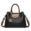 2025 Nova Entrada Bolsa Feminina de Luxo Leve Bolsa de Mãe Fashionável Atmosférica Portátil Bolsa para Mulheres de Meia-idade Fashionável Versátil Bolsa de Mão