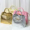 Bolso tote de diseño de nicho de moda, nudo metálico, tejido de cuero, hombro, portátil, gran capacidad, piel de vaca, bolso para mujer