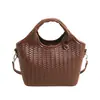 Bolsos para Mujer 2026 Verano Nuevo Estilo Simple Patrón Tejido Bolso de Mano Nicho Elegante Bolso de Hombro Bolso Cubo para Viajar Cruzado