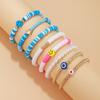 Europa e Estados Unidos estilo boêmio transfronteiriço amor rosto sorridente olhos pulseira moda personalidade popular pulseira de 8 peças atacado