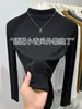 Top base de canalé de cuello alto medio para mujer, nuevo otoño/invierno 2026, corte ajustado, adelgazante, se puede usar como capa interior o exterior, top negro de manga larga