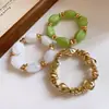 Pulsera elástica de acrílico geométrico irregular vintage nueva con un diseño de nicho, joyería de moda trendy para mujer