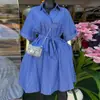 Moda Femenina Transfronteriza Europea y Americana Primavera 2026 Nuevo Elegante Vestido Camisa Azul con Solapa, Botones al Frente y Cinturón de Lazo