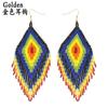 Pendientes de borlas de cuentas de arroz, estilo étnico retro bohemio, personalidad exagerada, comercio exterior creativo, pendientes hechos a mano europeos y americanos.