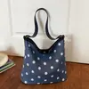 Bolso de hombro de lunares transfronterizo de nicho para mujer, nuevo modelo de verano 2026, bolsa de mano simple de gran capacidad para el día a día