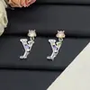Pendientes de Marca de Lujo Europea y Americana Transfronterizos Nueva Versión de Gama Alta con Letras del Logo, Pendientes de Rombo con Forma de Trébol de Cuatro Hojas para Mujer Venta al por Mayor