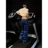 Pantalones de estilo retro americano a cuadros azules con cintura, pantalones de verano unisex de alta gama para el campus, pantalones casuales con un ambiente relajado y despreocupado