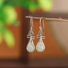 Pendientes de pipa de la suerte de estilo nacional vintage de jade Hetian de plata esterlina S925 de Yilu, pendientes de gancho para la oreja de estilo nacional con temperamento antiguo