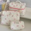 Bolsa de maquillaje acolchada con lazo blanco, pequeña, fresca y bonita, para estudiantes, portátil, para guardar artículos de aseo, de gran capacidad.