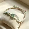 Nova pulseira de peixe em degradê verde claro estilo chinês com design de alta qualidade, incorporando a tendência da moda moderna chinesa, simbolizando prosperidade e boa sorte.