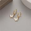 Pendientes de moda de lujo ligeros con microincrustaciones de diamantes y hebilla de oreja de alta gama con mariposa Jixiang para niñas, moda coreana, hebilla de oreja exquisita