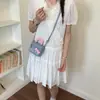 Versátil Linda para Viajar 2026 Bolso Cruzado Pequeño con Capacidad, Estilo Nuevo, Diseño de Dibujos Animados, Mini Bolso de Nicho para Mujer de Verano