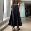 Saia de lã marrom estilo coreano da moda para mulheres, outono e inverno, cintura alta, drapeada, cobre o quadril, longa em A, saia ampla tipo guarda-chuva