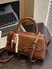 Bolso de Mano Cuadrado Pequeño Retro de Alta Gama de Moda Transfronterizo para Mujer Modelo Nuevo 2026 Bolso de Hombro Cruzado de Gran Capacidad Versátil