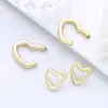 Pendientes versátiles de temperamento de alta gama estilo Hepburn de Instagram pendientes en forma de corazón pendientes de botón de corazón tridimensionales exquisitos a la moda simples